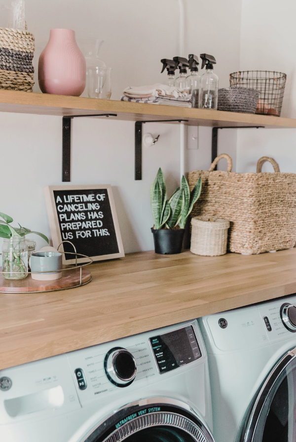 Stylish laundry room setup showcasing expert picks for the best laundry hampers on Amazon, curated by The Michi Method, a professional organizing blog.